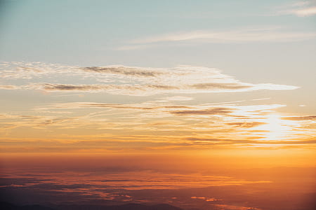sunset over body of water thumbnail