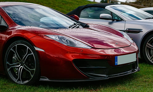 close-up photo of red sport car thumbnail