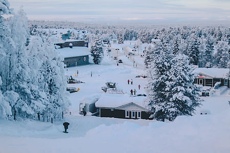 white and black house during winter season thumbnail