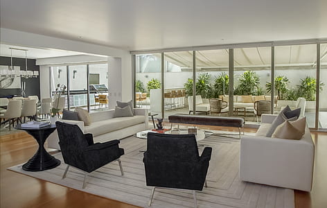 couch and armchairs standing inside the living room thumbnail