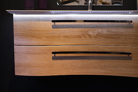 close-up photo of closed brown wooden 2-drawer dresser thumbnail