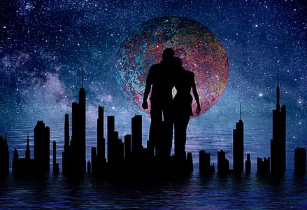 couple near buildings silhouette against multicolored moon thumbnail