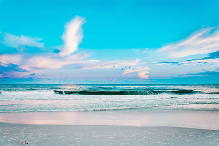 sea wave under blue and white sky at daytime thumbnail