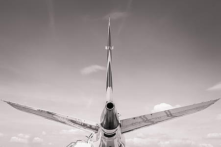 grayscale photo of plane during daytime thumbnail