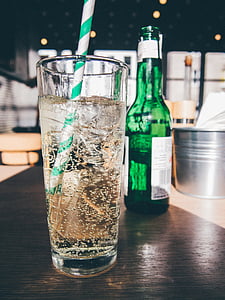 clear glass with beer and straw on bar thumbnail