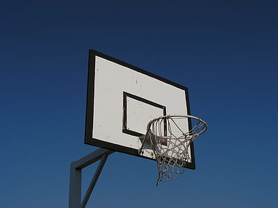 white and black basketball hoop during daytime thumbnail