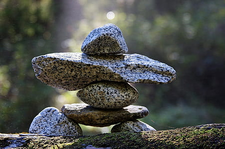 depth of field photography of gray balancing stone thumbnail