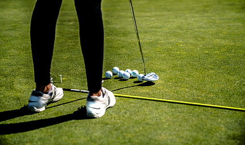 Woman Holding Golf Driver thumbnail