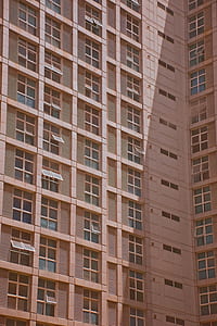 brown high-rise concrete building thumbnail