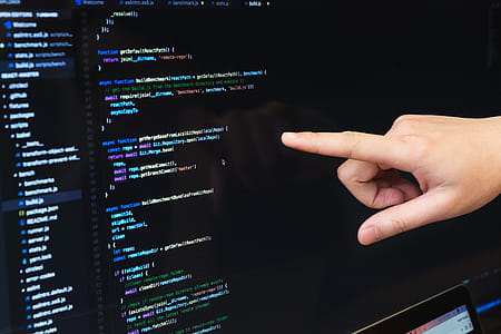 Finger Pointing At Javascript Code Photo thumbnail