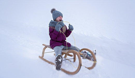 boy riding sleigh thumbnail