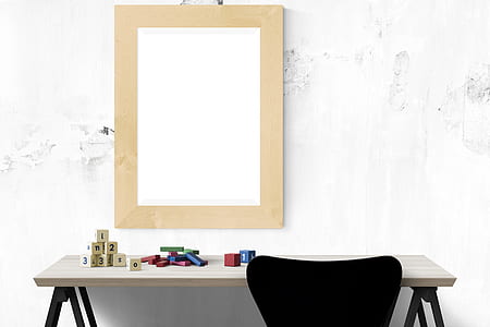 black chair beside console table and white wall thumbnail