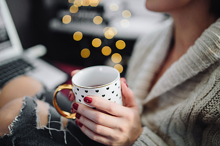 Woman drinking hot tea in her home office thumbnail