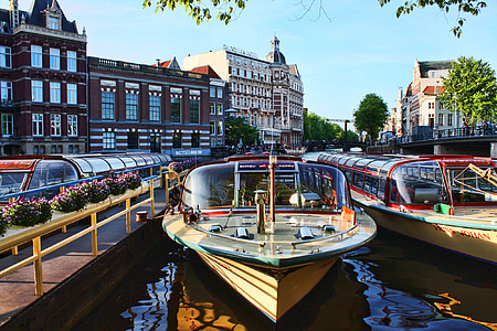brown boat during daytime thumbnail