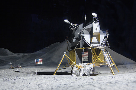 American flag beside gray satellite thumbnail