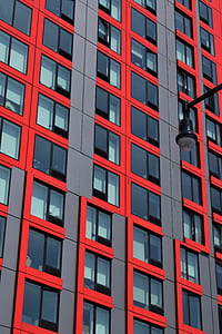 red and gray high rise building thumbnail