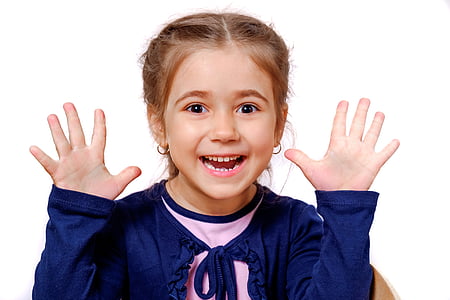 girl in blue long-sleeved shirt thumbnail