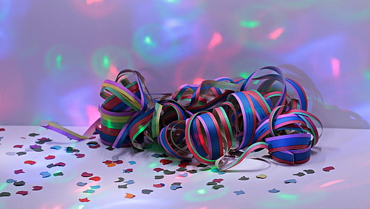 multicolored ribbon on top of white surface with lights thumbnail