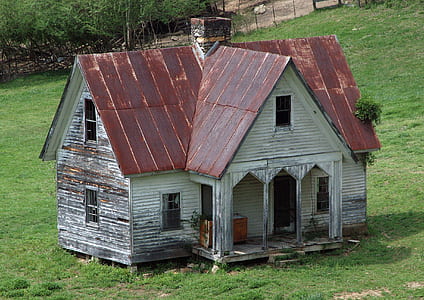 brown and white wooden house thumbnail