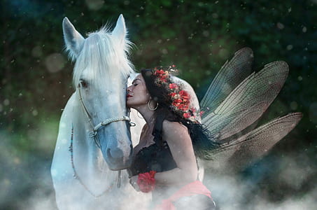 woman kissing the face of white horse thumbnail