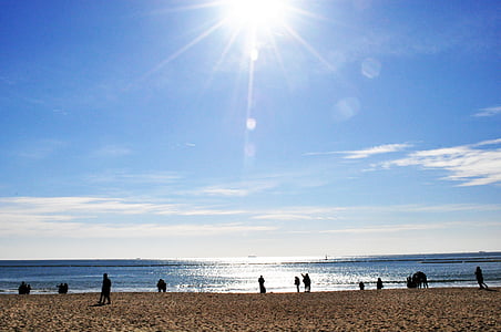people on seashore under blue sky thumbnail
