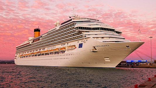 white ship on ocean during twilight thumbnail