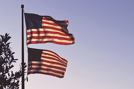 two USA flag in flag pole thumbnail