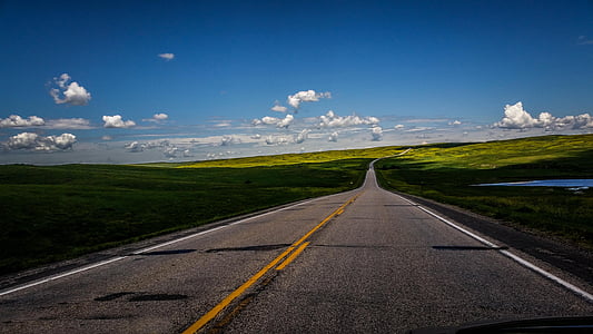 photo of road during daytime thumbnail