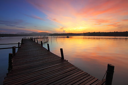 brown wooden dock on water thumbnail