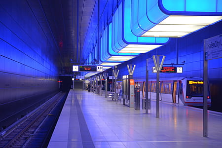 White Ceramic Tiles Near Black Train Rail thumbnail