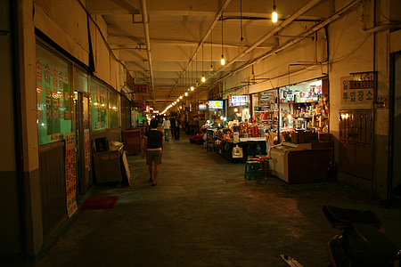 man in street during nighttime thumbnail