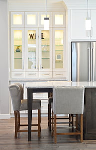 photo of table and chairs beside cabinet thumbnail