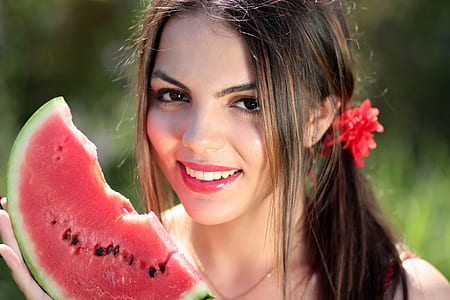 female holding watermelon thumbnail