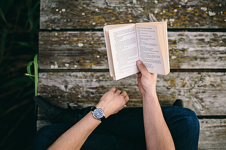 Reading book at lake thumbnail