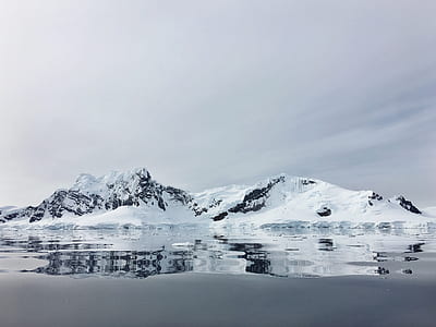 mountain covered in snow at daytime thumbnail
