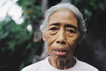 selective-focus photography of person's face thumbnail