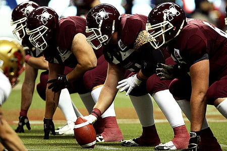 shallow focus photo of football players thumbnail