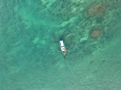 aerial view of boat on water thumbnail