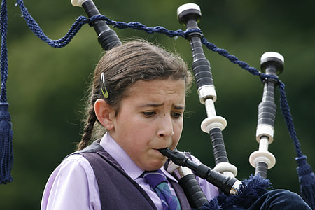 woman playing wind instrment thumbnail