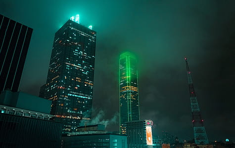 gray concrete building under gray dark skies thumbnail