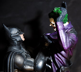 close-up photo of Batman and Joker action figures thumbnail