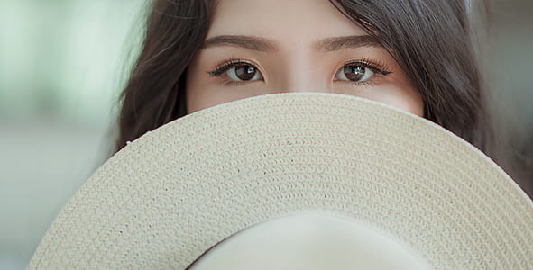 White Hat in Woman's Face thumbnail