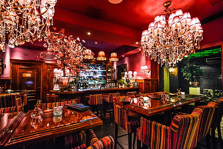 photo of chandelier and dining tables thumbnail