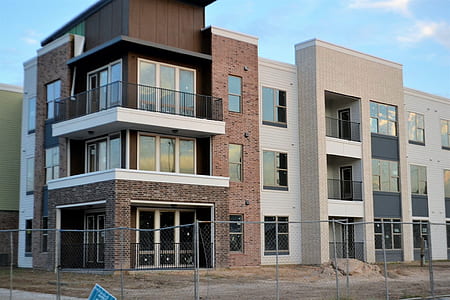 brown and white concrete building during daytime thumbnail