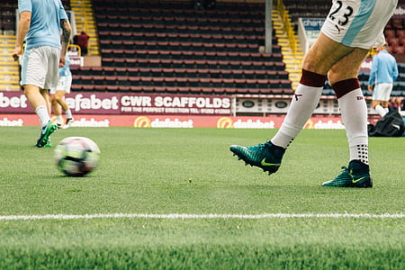 person kicking white ball thumbnail