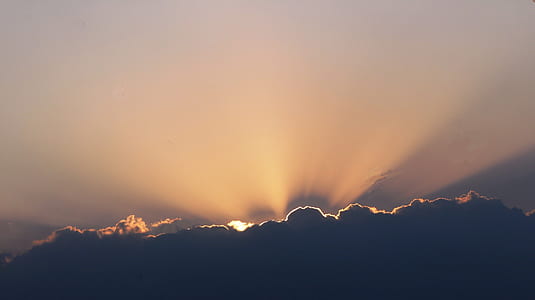silhouette photography of clouds during holden hour thumbnail