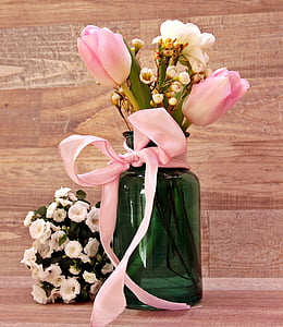 two pink and one white flowers on green vase thumbnail