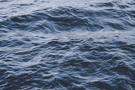 photography of body of water waves thumbnail