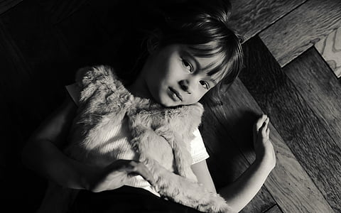 girl lying on floor thumbnail
