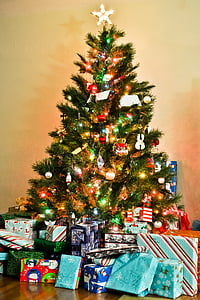 lighted christmas tree with gifts thumbnail